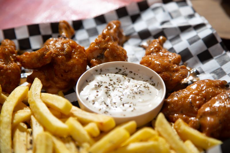 Buffalo wings with blue cheese dip at Jet's pizza