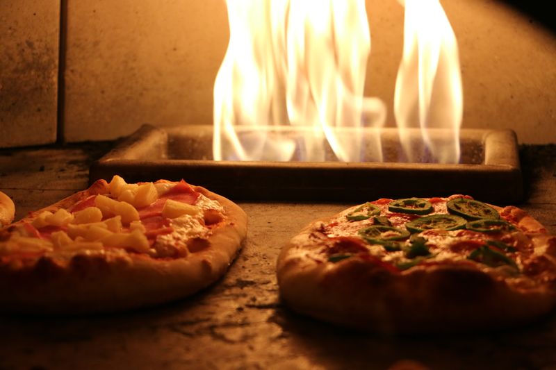 Jet's pizza kitchen — hand-tossing authentic Brooklyn pizza dough