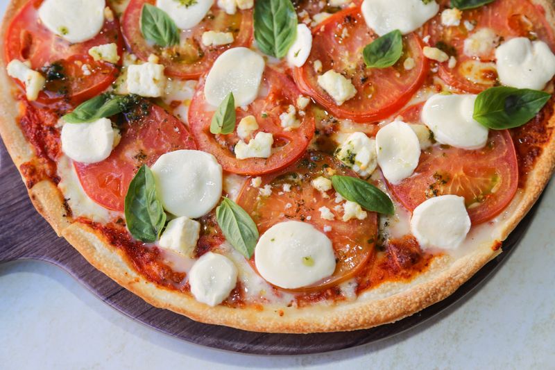 Margherita Classic jet's pizza with fresh basil and mozzarella