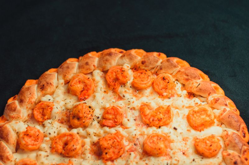 Meat Lovers Deluxe jet's pizza with pepperoni sausage and bacon